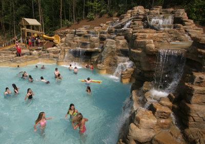 In building a new indoor

waterpark, Vermont’s Jay Peak resort plans to theme based on

the local character and resort environment. The approach is similar

to that of Dollywood’s Splash Country (shown) in

Tennessee.