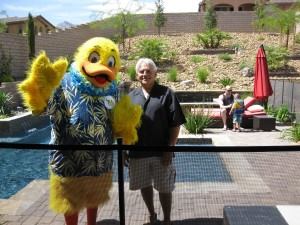 Duckie and Joseph Vasallo hanging out by a pool.