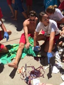 BE PREPARED The visual shock of serious injuries can take a lifeguard’s heart rate into the Gray or even Black Zone. Desensitization Drills and moulage (applying mock injuries and gore) help them practice stress-controlling skills. Here, the moulage drill involves a leg “amputation.”