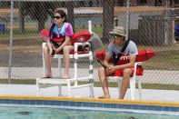 March, 2015: Eliana Villarreal, 14, watches over the pool alongside her brother, lifeguard Nino Villarreal, during the lifeguard shadowing" portion of the Junior Lifeguarding class as part of the Red Cross Centennial Campaign in at a Brevard County Parks and Recreation facility in Florida.