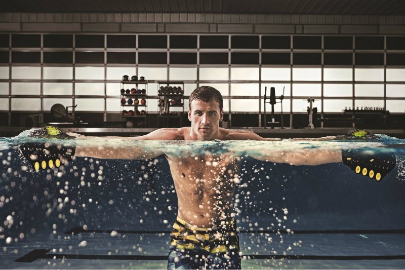 Rippling Effect: Speedo FIT's marketing campaign features striking imagery such as Olympian Ryan Lochte seen here using Clutch Paddles, one of several products in the brand's line of water workout gear.