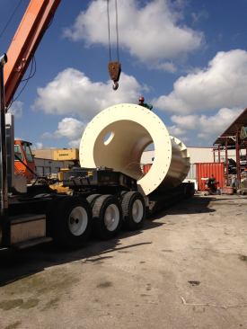 Portions of Tower 1 are loaded onto a truck and headed to Kansas.