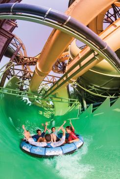 For a unique experience, WhiteWater built its first Anaconda, a slide within a slide. Visitors can ride in a raft through the world's largest-diameter slide, which measures 30 feet. Or they can zip through the two flumes running directly above.