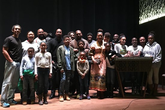 BKS members with sports curator Dr. Damion Thomas in the in the Oprah Winfrey Theatre at the National Museum of African American History and Culture.