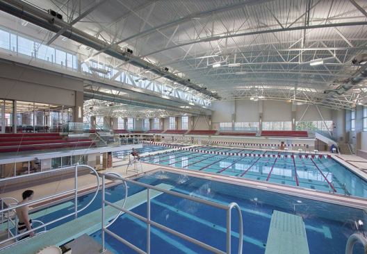 Say the designers: “Until the completion of the new Trumbull Aquatics Center, swimming and diving competitions were the only conference events Denison could not host on campus. The new Trumbull Aquatics Center provides the opportunity to host major meets, revamps the visitor experience, and provides a visible single point of entry that enhances security and oversight. It allows Denison to stand out among its North Coast Athletic Conference peers [and] gives Denison athletes a competitive training edge...”