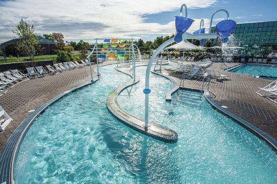 The club now includes a lazy river, designed for teens and family. Play features are simple in design and free of strong theming to avoid an over-the-top feeling but provide a relaxed air. For a visual pop, the play features have translucent color panels that reflect their hues onto the deck. To reduce the use of water, energy and chemicals, the systems include regenerative filters. Variable-frequency drives were used on all larger pumps to save on energy. Designers estimated that the water- and energy-saving measures would pay for themselves in a couple years. The features are sanitized with ozone.