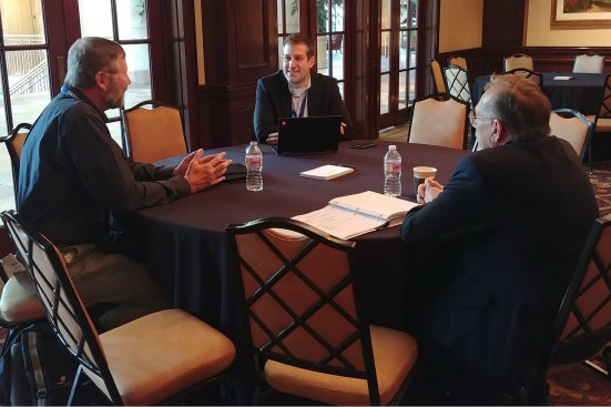 Carl Nylander at a meeting with the MAHC's design/construction specialists.