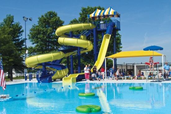 Higginsville Aquatic Center was designed with maximum community input and offers a variety of features for all ages. The littlest ones have deck sprays and a themed play structure; older children have floatables, slides and a diving board; and, the adults have an easily accessible facility that offers a variety of opportunities for exercise and relaxation.The facility is laid out with space to accommodate various exercise programs.  The pool is 25-yards wide to allow lap swimming, with a depth between 3 and 5 feet. This creates an ideal area for water aerobics and aqua therapy