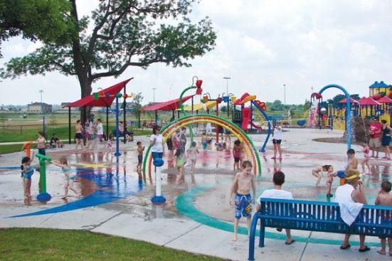 Cost saving and water conservation strategies include reduced-consumption nozzles and spray heads, and a touch bollard activator, which allows the community to save water and money. Waterfeatures operate only when a child touches the activator during operational hours pre-set by the city. Programmed spray sequences operate waterfeatures at different times and locations to generate interest and interactivity within the splash bays. In addition, the stainless steel spray elements are 100 percent recyclable at the end of life. Plastics are recyclable through a program offered by the supplier, and brass spray heads and nozzles are lead-free.