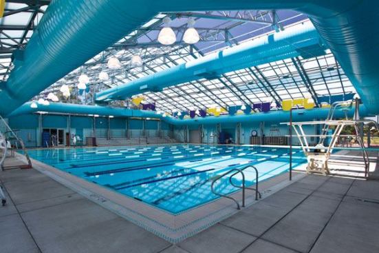 The natatorium is enclosed using a pre-engineered aluminum greenhouse-like structure with an operable roof system that allows up to 50 percent of the roof to be opened. Room for future growth was an important consideration in design and the current HVAC system, inter-connected to the operable

roof system, is sized to accommodate expansion. The pre-engineered aluminum structure can also be easily modified and expanded to handle future development.