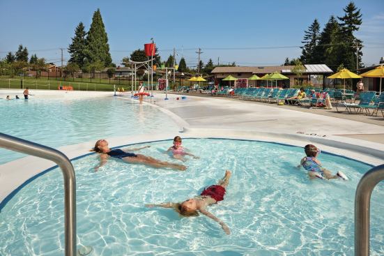 The circular “Tot Pool” is not only accessible to little ones, but also versatile. The zero-depth perimeter gradually descends to 12 inches, and low-impact waterfeatures, such as geysers and a cascading water toy, offer small children a safe, calm environment. When the larger wave pool is closed, the Tot Pool can be drained and function as a spraypark for older kids.