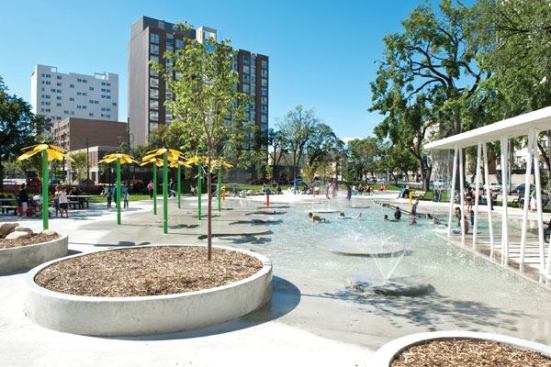 Along with the wading pool,

which features concrete islands, ground spray features, a waterfall

and a UV system to help maintain water quality, amenities at

Central Park include an interactive water table with troughs for

water-manipulated play, a unique dry playground and an embedded

artificial turf soccer field. Amenities were added as part of a

plan to revitalize a historic park that had become rundown and

potentially dangerous. Now, the park is the pride of the

predominantly immigrant community it serves.