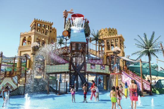 "The Legend of the Lost Pearl” follows a fictitious character created specifically for Yas Waterworld. Dana is a young Emirati girl on a quest for the legendary pearl that brought prosperity to her village long ago. The rides and attractions follow her journey with theming, story lines and costumed characters. Pictured is Marah Fortress, a children’s playground that includes six slides, two dumping buckets, a water-shooting geyser and water cannons.
